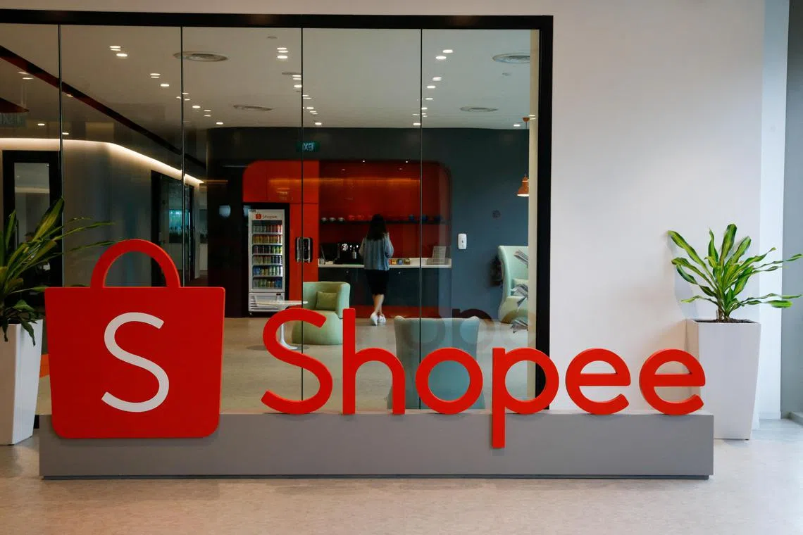 FILE PHOTO: A signage of Shopee, the e-commerce arm of Southeast Asia's Sea Ltd, is pictured at their office in Singapore, March 5, 2021. REUTERS/Edgar Su/File Photo