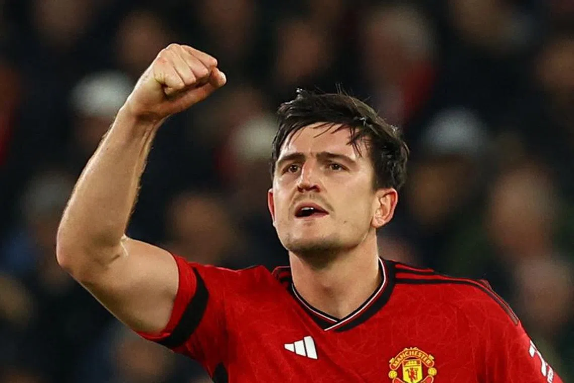 Soccer Football - Champions League - Group A - Manchester United v FC Copenhagen - Old Trafford, Manchester, Britain - October 24, 2023 Manchester United's Harry Maguire celebrates scoring their first goal REUTERS/Molly Darlington