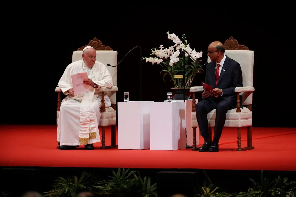 ST20240912_202401000692/pixpope12/Jason Quah Pope Francis and President Tharman Shanmugaratnam at the State Address at National University Singapore (NUS) University Cultural Centre (UCC) on Sept 12, 2024. ST PHOTO: JASON QUAH