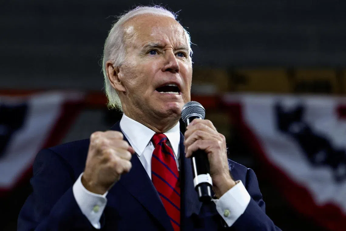 US President Joe Biden delivers an economic speech at a steamfitters union hall in Virginia.