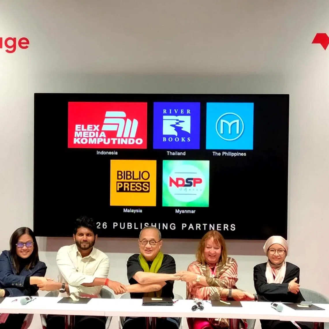 Epigram Literary Foundation founder Edmund Wee (centre) with (from left) Milflores Publishing publisher Andrea Pasion-Flores, The Biblio Press publisher Kiridaren Jayakumar, River Books editor and publisher Narisa Chakrabongse and Elex Media Komputindo editorial manager Jarwati. NDSP Books publisher Aung San Mon could not be in Frankfurt to sign the agreement.