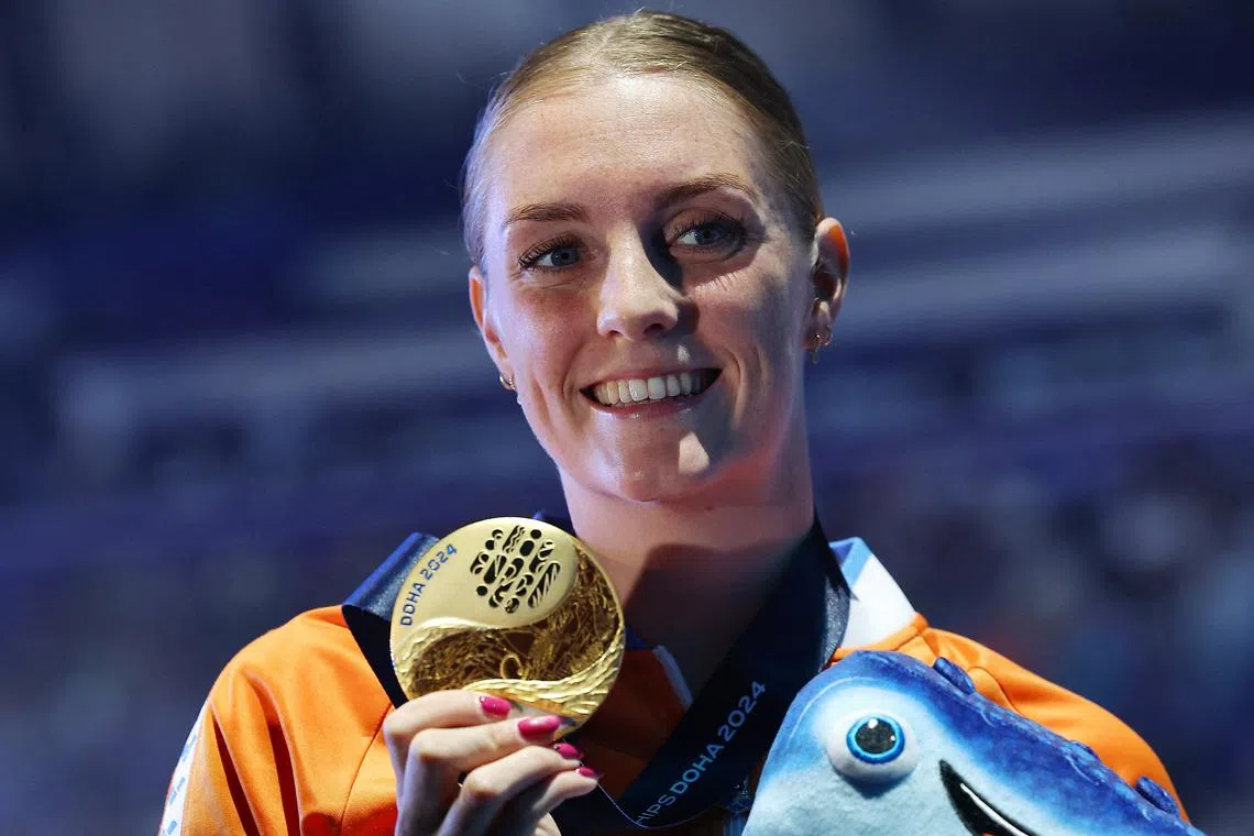 FILE PHOTO: Swimming - World Aquatics Championships - Aspire Dome, Doha, Qatar - February 16, 2024 Gold medallist Netherlands' Marrit Steenbergen poses with her medal as she celebrates after winning the women's 100m freestyle final REUTERS/Evgenia Novozhenina/File Photo
