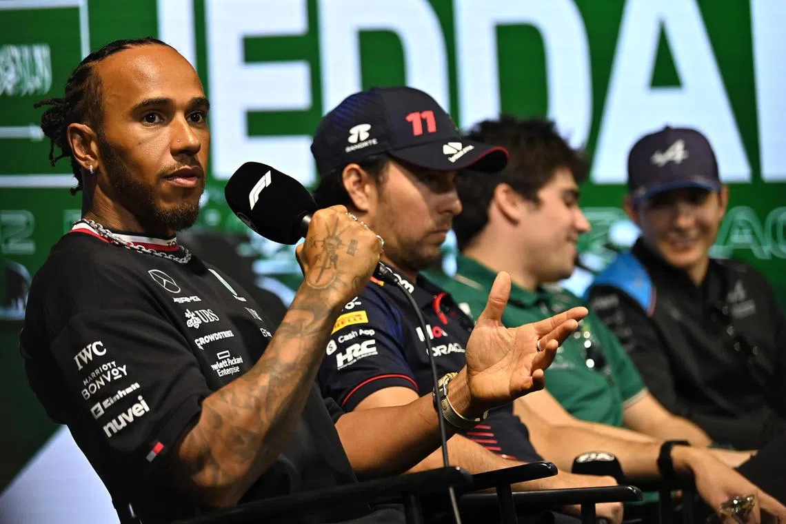 Mercedes' Lewis Hamilton attends a  drivers' press conference in Jeddah, with (from left) Red Bull's Sergio Perez, Aston Martin's Lance Stroll and Alpine's Esteban Ocon.