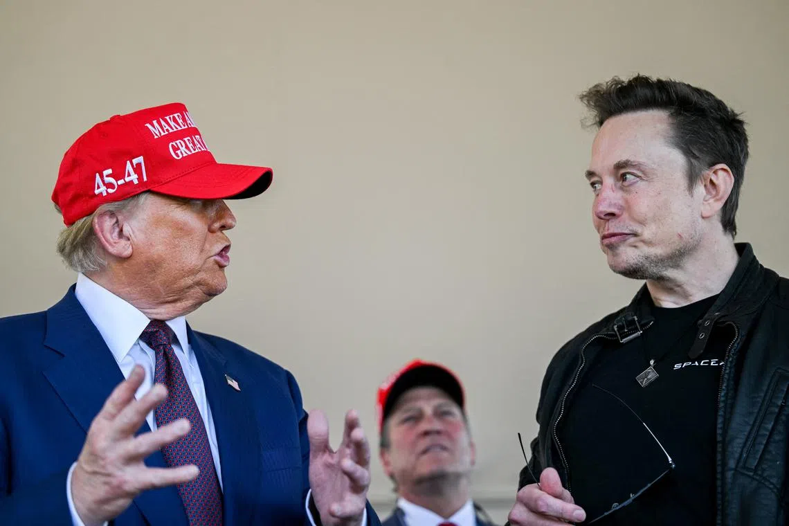 Elon Musk speaks with U.S. President-elect Donald Trump at a viewing of the launch of the sixth test flight of the SpaceX Starship rocket in Brownsville, Texas, U.S., November 19, 2024 Brandon Bell/Pool via REUTERS