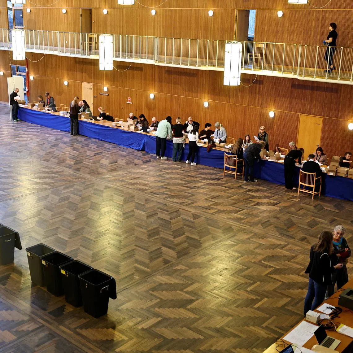 People at a polling station on the day of the parliamentary election, at Aarhus City Hall in Aarhus, Denmark March 24, 2026. Mikkel Berg Pedersen/Ritzau Scanpix/via REUTERS