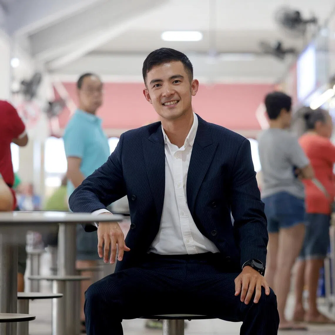 Insurance boss Lucas Neo, who sparked controversy and received backlash for his Exposing Michelin Hawkers series on social media, at Yuhua Place Market and Hawker Centre.