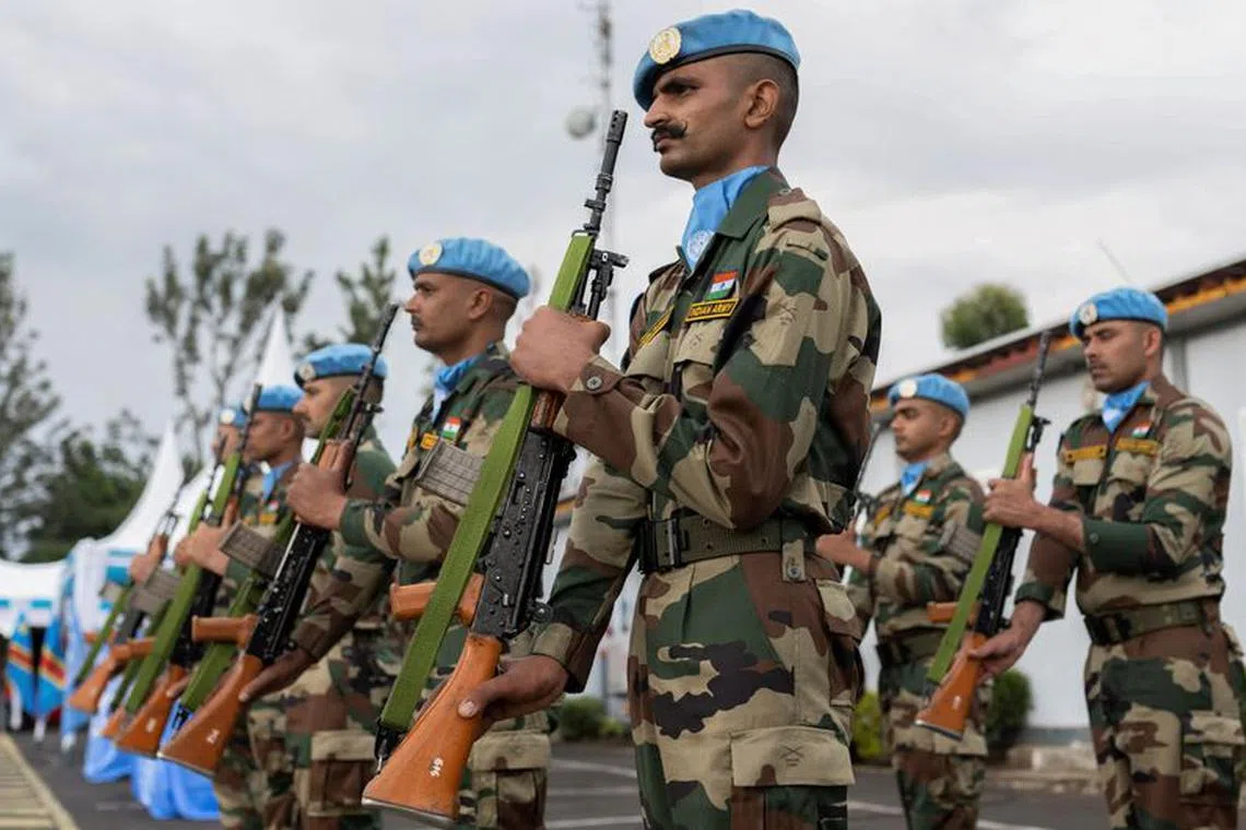 Peacekeepers serving in the United Nations Organization Stabilization Mission in the Democratic Republic of the Congo (MONUSCO) stand in formation as they pay tribute during the visit of the Security Council of the United Nations in Goma, North Kivu province of the Democratic Republic of Congo March 11, 2023. REUTERS/Arlette Bashizi/File Photo
