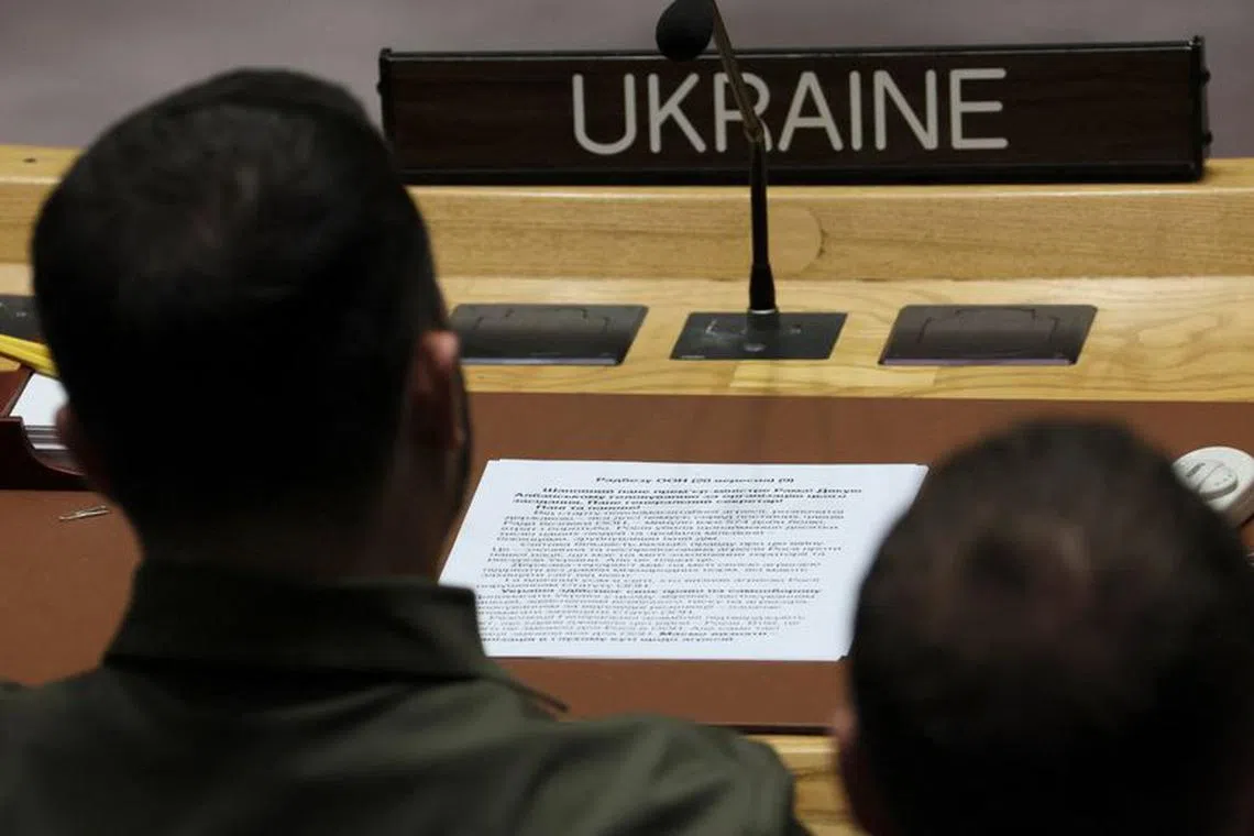 Ukraine's President Volodymyr Zelenskiy has his address to the United Nations Security Council laid out on the desk in front of him as he attends a ministerial level meeting of the Security Council on the crisis in Ukraine at U.N. headquarters in New York, September 20, 2023. REUTERS/Brendan McDermid