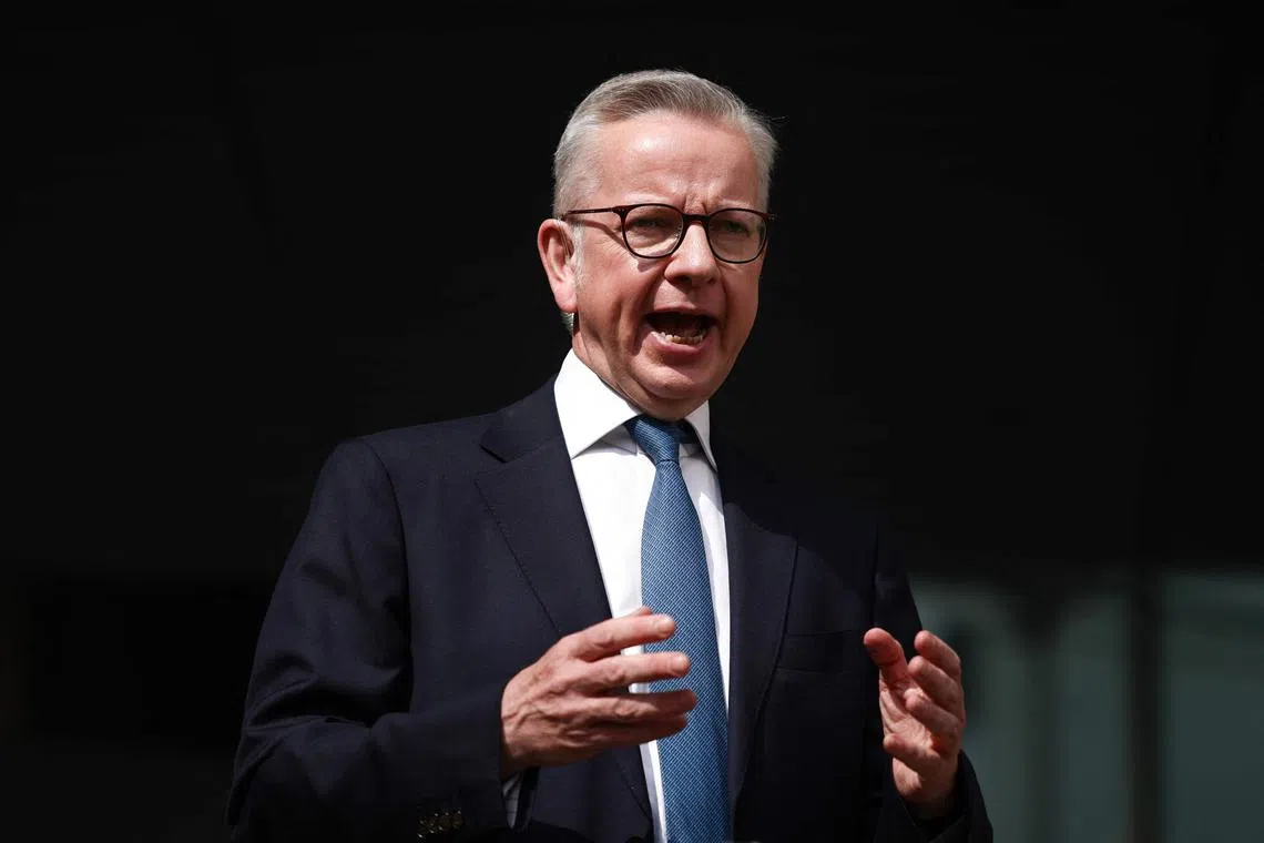Britain's Housing Secretary Michael Gove speaking to members of the media after appearing on the BBC's 'Sunday' political television show at the BBC studios in central London on Sunday. 