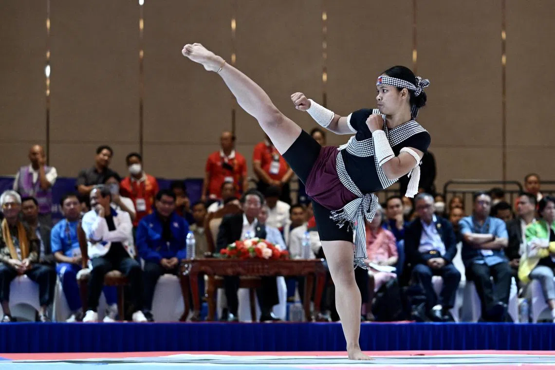 Cambodia's Leakena Mao performing her routine in the Bokator Spirit Form category during the Kun Botakor competition at the Croy Changvar Convention Centre on May 4, 2023.