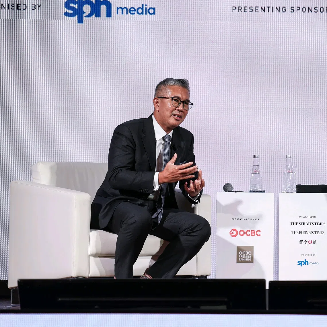 Malaysia’s Investment, Trade and Industry Minister Tengku Zafrul Abdul Aziz (left) speaking during a fireside chat with Business Times editor Chen Huifen at the Asia Future Summit 2025 on Oct 8.