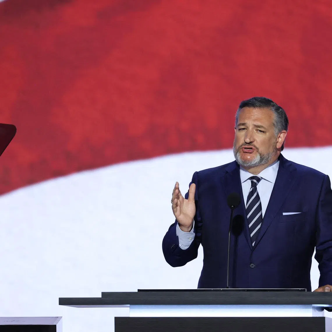 FILE PHOTO: Senator Ted Cruz (R-TX) gestures as he speaks on Day 2 of the Republican National Convention (RNC), at the Fiserv Forum in Milwaukee, Wisconsin, U.S., July 16, 2024. REUTERS/Mike Segar/File Photo