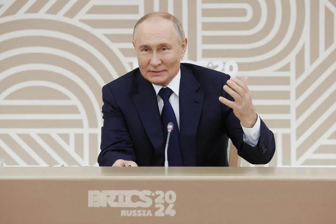 Russian President Vladimir Putin attends a meeting with heads of leading media outlets from the BRICS member countries in Moscow, Russia October 18, 2024. Sputnik/Vyacheslav Prokofyev/Pool via REUTERS
