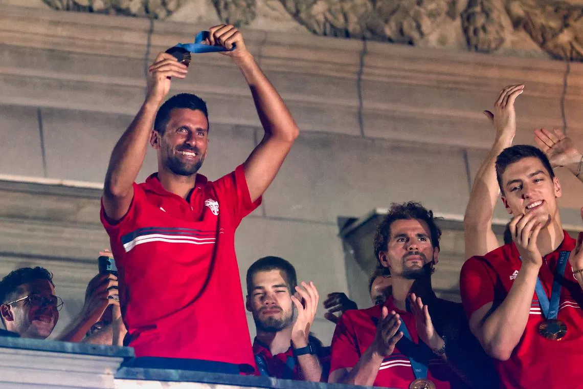 Tennis player Novak Djokovic and members of Team Serbia celebrate during the welcoming ceremony for Serbian Olympic champions, in Belgrade, Serbia, August 12, 2024. REUTERS/Zorana Jevtic/ File Photo