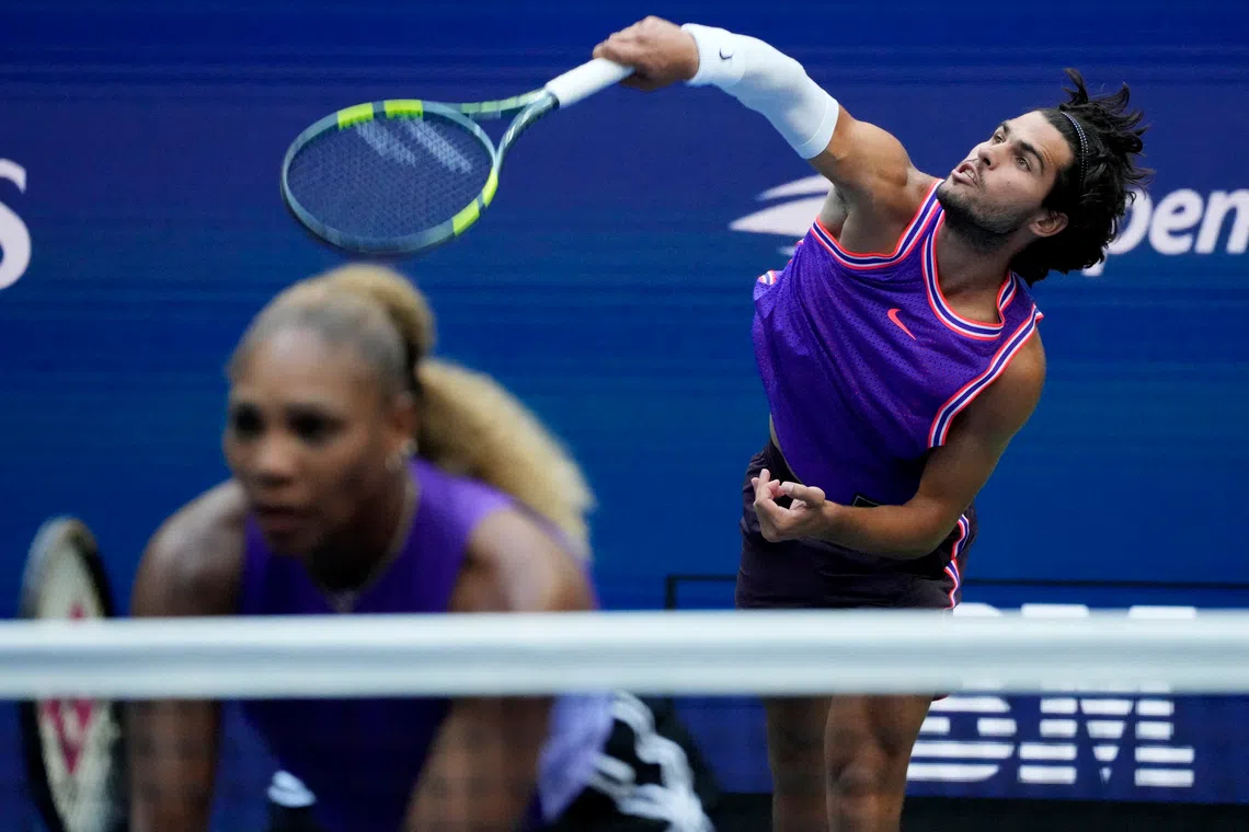Carlos Alcaraz (right) during his US Open mixed-doubles quarter-final match with Serena Williams.