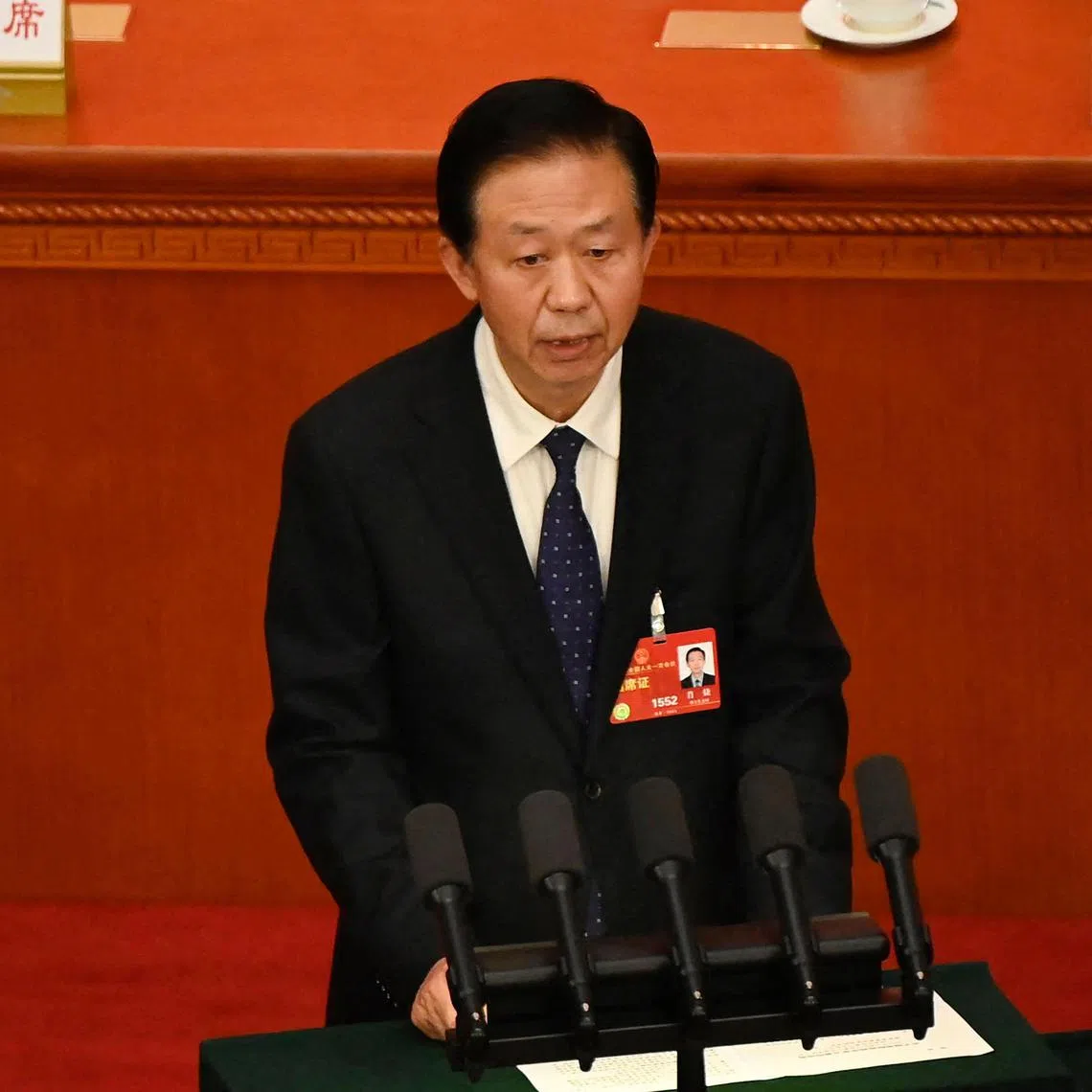 State Councilor and Secretary-General of the State Council Xiao Jie speaks during the second plenary session of the National People's Congress (NPC) at the Great Hall of the People in Beijing on March 7, 2023. (Photo by Greg Baker / AFP)