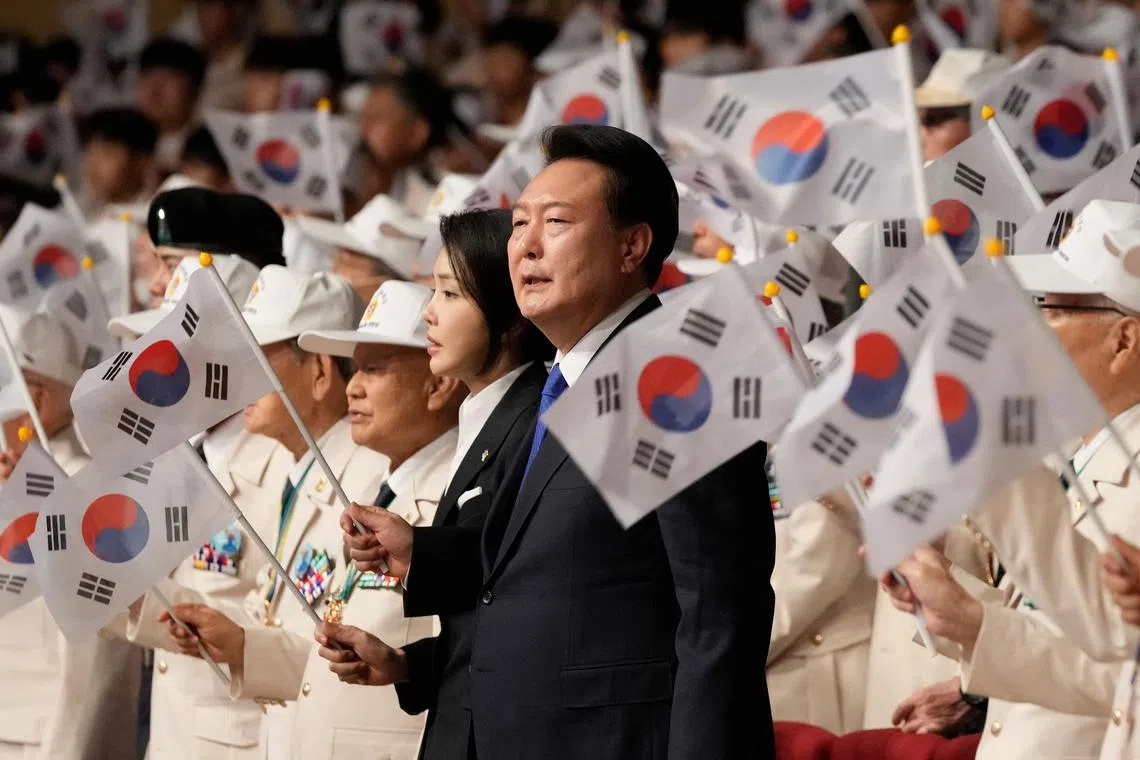 South Korean President Yoon Suk-yeol and his wife Kim Keon-hee at a ceremony in Daegu marking the 74th anniversary of the start of the Korean War on June 25.