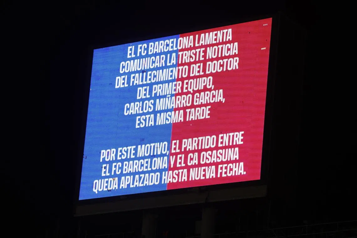 Soccer Football - LaLiga - FC Barcelona v Osasuna - Estadi Olimpic Lluis Companys, Barcelona, Spain - March 8, 2025 A message is displayed on the screen advising that the match has been postponed due to the death of Carlos Minarro Garcia, a member of FC Barcelona's medical staff REUTERS/Albert Gea