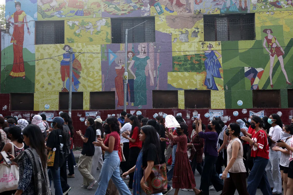 College students taking part in a solidarity march demanding police action and better safety for women following the alleged gang rape of a girl, in New Delhi, on Sept 23.