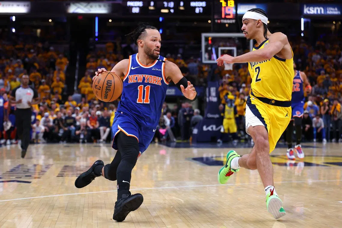Jalen Brunson of the New York Knicks drives the ball against Andrew Nembhard of the Indiana Pacers during the fourth quarter in Game 3.