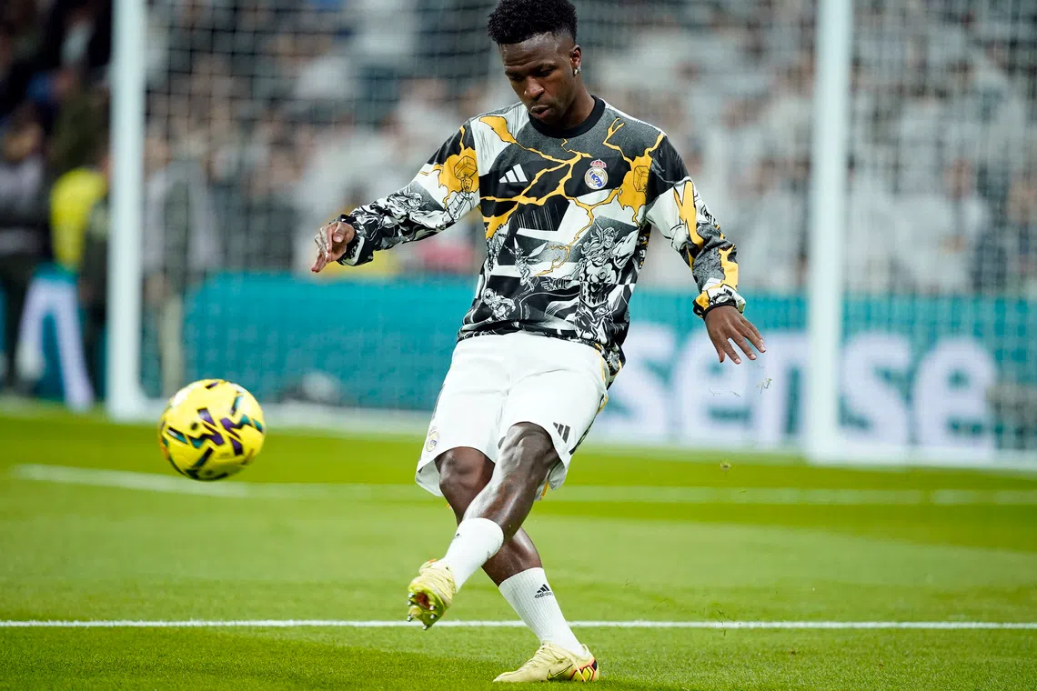 Soccer Football - LaLiga - Real Madrid v Celta Vigo - Santiago Bernabeu, Madrid, Spain - December 7, 2025 Real Madrid's Vinicius Junior during the warm up before the match REUTERS/Ana Beltran