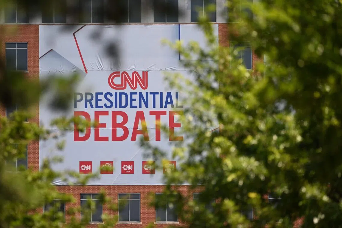 CNN signage hangs outside the studios at the Turner Entertainment Networks as Atlanta prepares one day ahead of the first 2024 presidential debate between US President Joe Biden and former President Donald Trump on June 26.