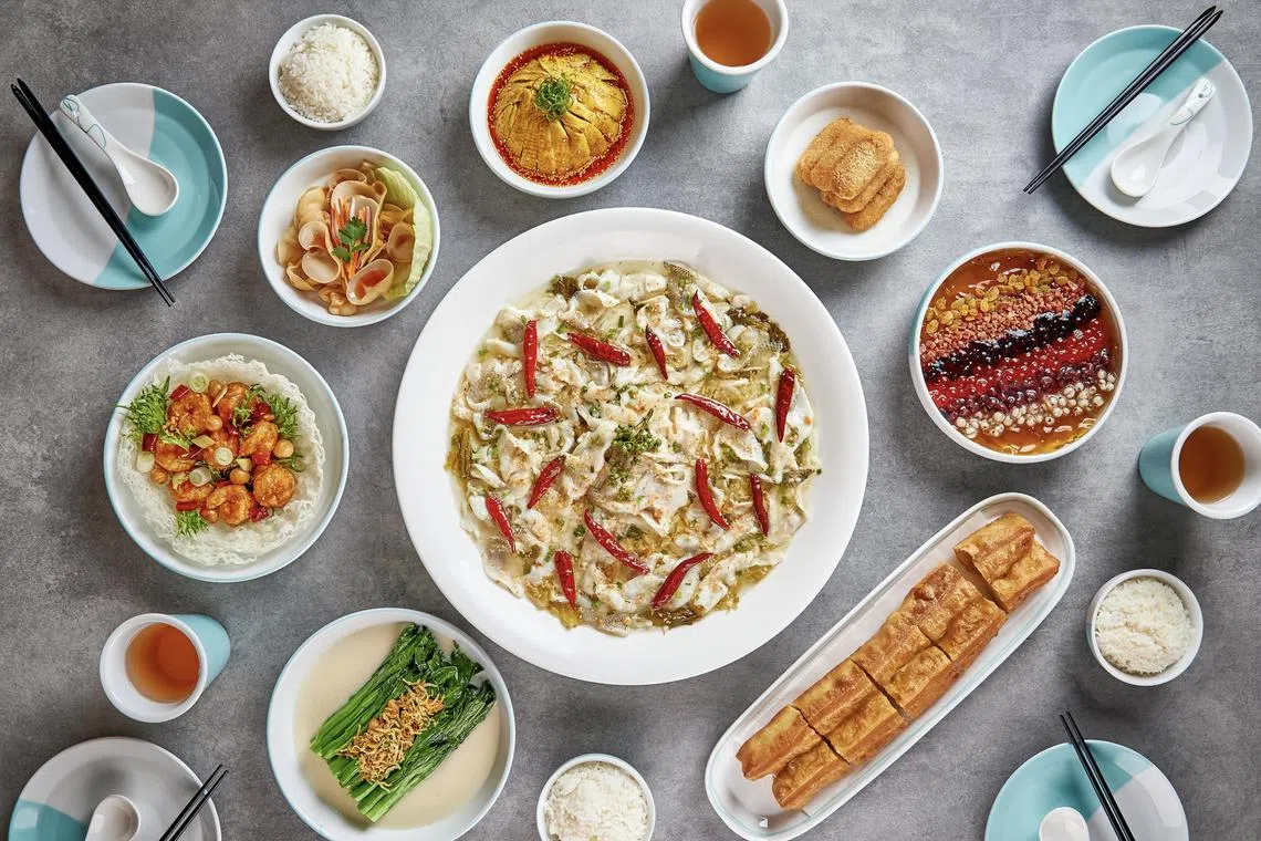 Yao Yao Sauerkraut Fish's star dish with accompanying sides. 