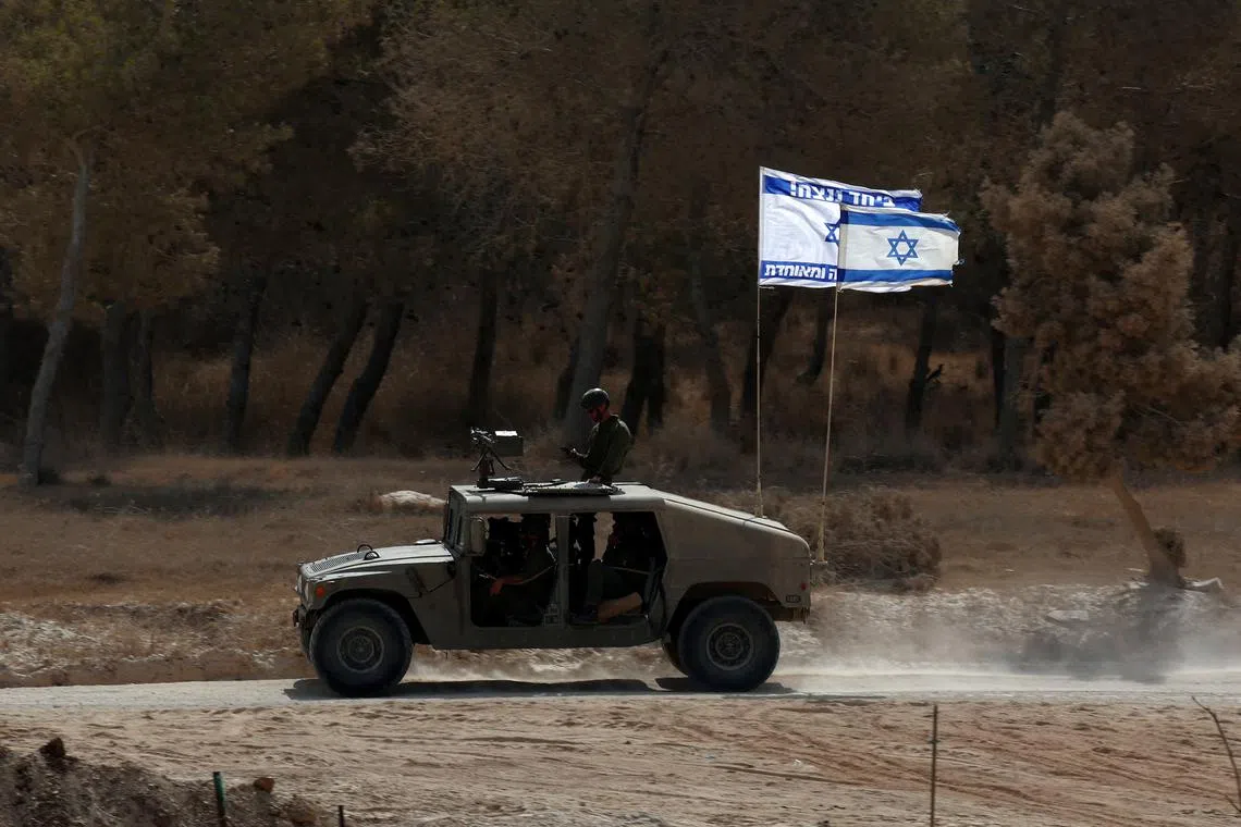 FILE PHOTO: Israeli military patrols near the Israel-Gaza border, amid the Israel-Hamas conflict, in Israel, August 23, 2024. REUTERS/Florion Goga/File Photo