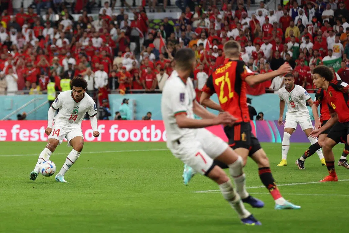 Morocco's Zakaria Aboukhlal scores their second goal against Belgium in their Group F game at Al Thumama Stadium in Doha, Qatar on Nov 27.