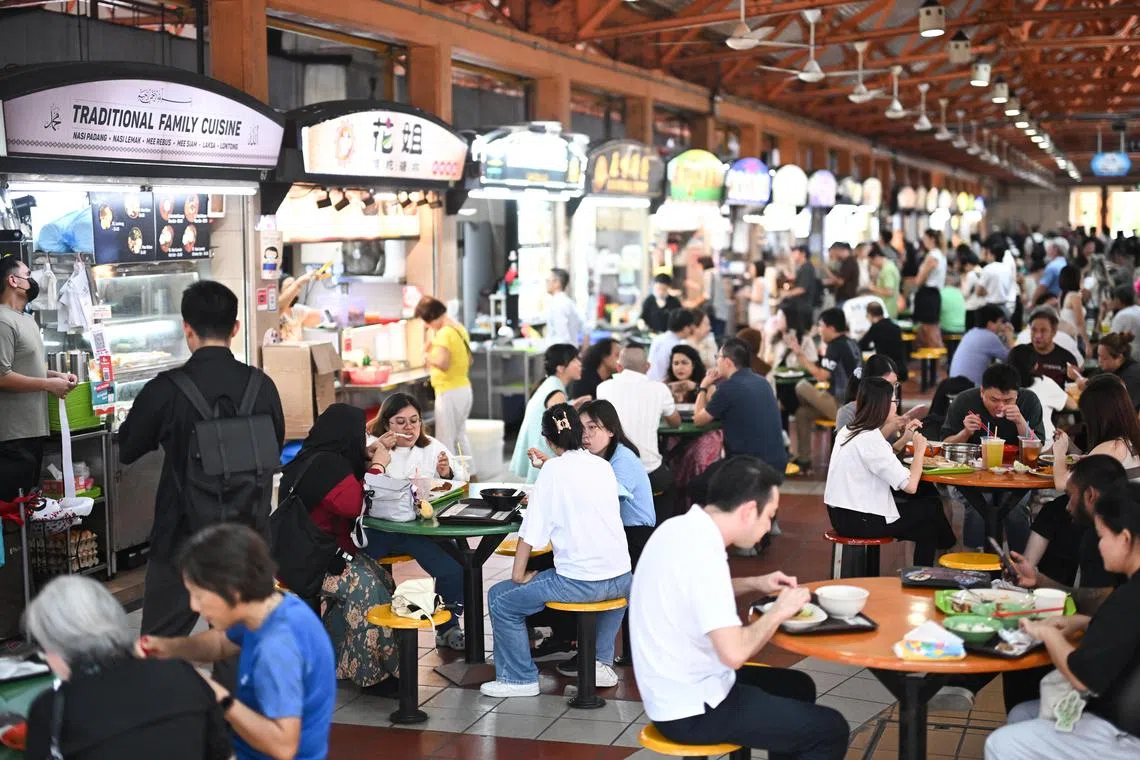 ST20241105-202479200641-Lim Yaohui-pixgeneric/
People having lunch at Maxwell Food Centre on Nov 5, 2024.
Hawkers who submit high bids for stalls from November’s tender exercise will no longer see their rents drop immediately to market rates after their three-year tenancy, as is the case now.
This is to encourage them to exercise restraint and prudence when making their bids. The new initiative was announced on Nov 4 by the National Environment Agency (NEA) for stalls under its purview. Existing hawkers will not be affected.
The Straits Times understands that about 200 market and cooked food stalls are put up for each tender exercise.
Over 6,000 cooked food stalls and more than 7,000 market stalls are currently under NEA’s purview.
(ST PHOTO: LIM YAOHUI)