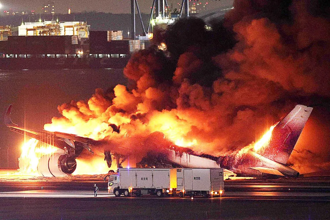 A Japan Airlines plane was in flames on the runway of Tokyo's Haneda Airport on January 2 after apparently colliding with a coast guard aircraft, media reports said. 