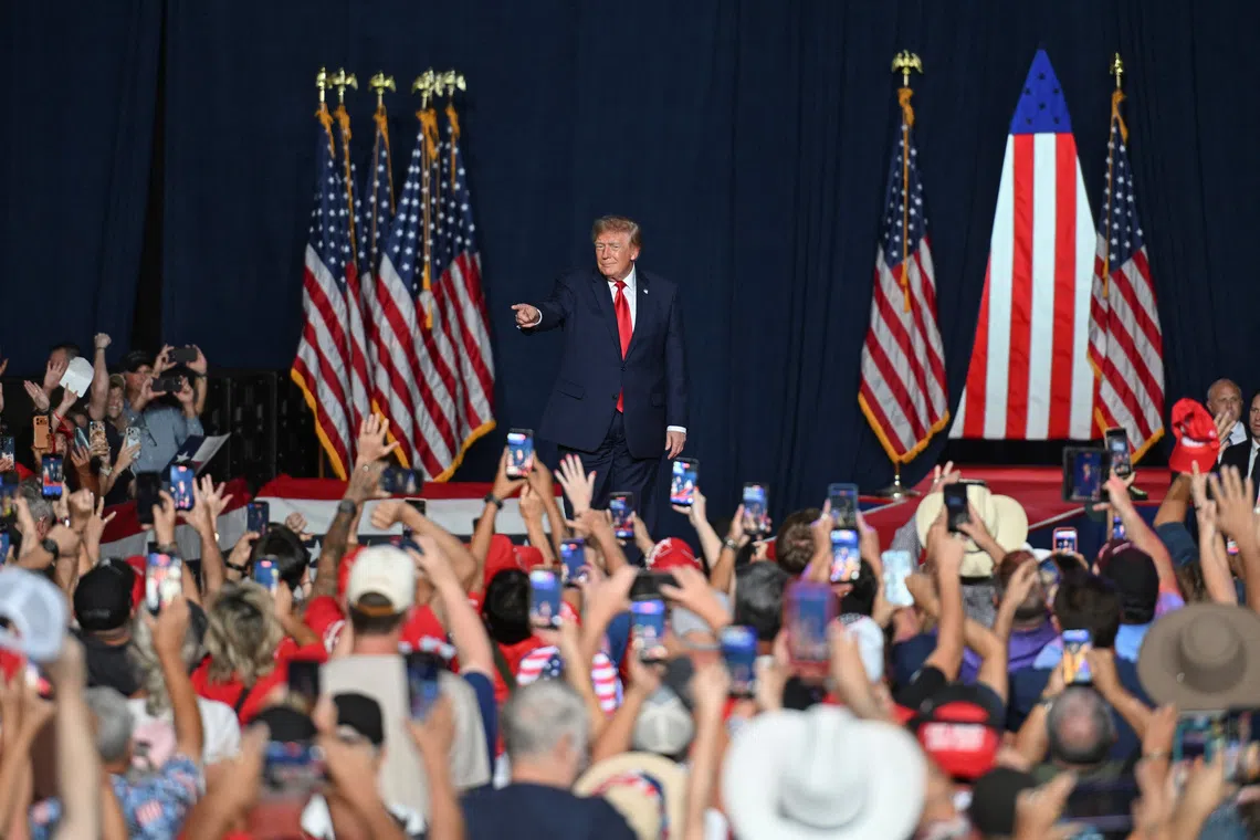 US President Donald Trump walks on stage during a campaign event ahead of the midterms, in San Antonio, Texas, US, October 7, 2026. REUTERS/Callaghan O'Hare