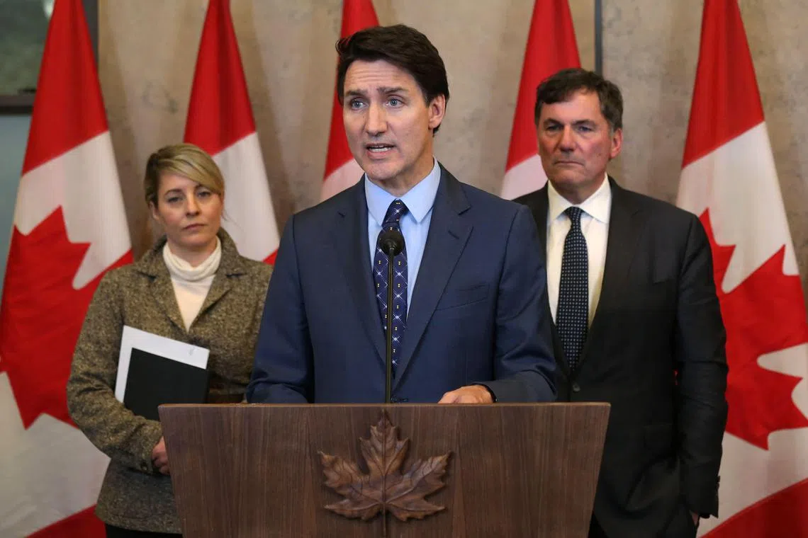 Canadian Prime Minister Justin Trudeau (centre), with Foreign Minister Mélanie Joly (left) and Public Safety Minister Dominic LeBlanc speaking during a press conference on Oct 14 in Ottawa after Canada expelled six top Indian diplomats, including the country's ambassador. 