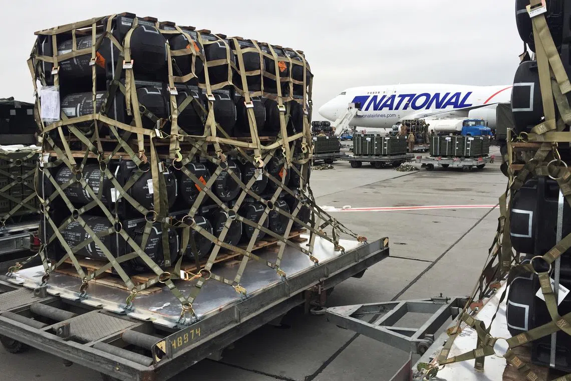 Military aid, delivered as part of the United States of America's security assistance to Ukraine, is unloaded from a plane at the Boryspil International Airport outside Kyiv, Ukraine February 11, 2022. REUTERS/Serhiy Takhmazov/File Photo
