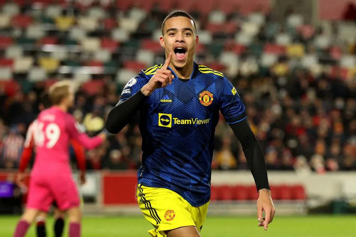 FILE PHOTO: Soccer Football - Premier League - Brentford v Manchester United - Brentford Community Stadium, London, Britain - January 19, 2022 Manchester United's Mason Greenwood celebrates scoring their second goal REUTERS/Ian Walton/File Photo