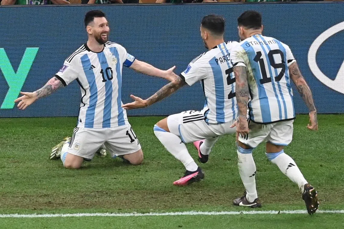 epa10372748 Lionel Messi (L) of Argentina celebrates after scoring the 3-2 goal during the FIFA World Cup 2022 Final between Argentina and France at Lusail stadium, Lusail, Qatar, 18 December 2022.  EPA-EFE/Georgi Licovski