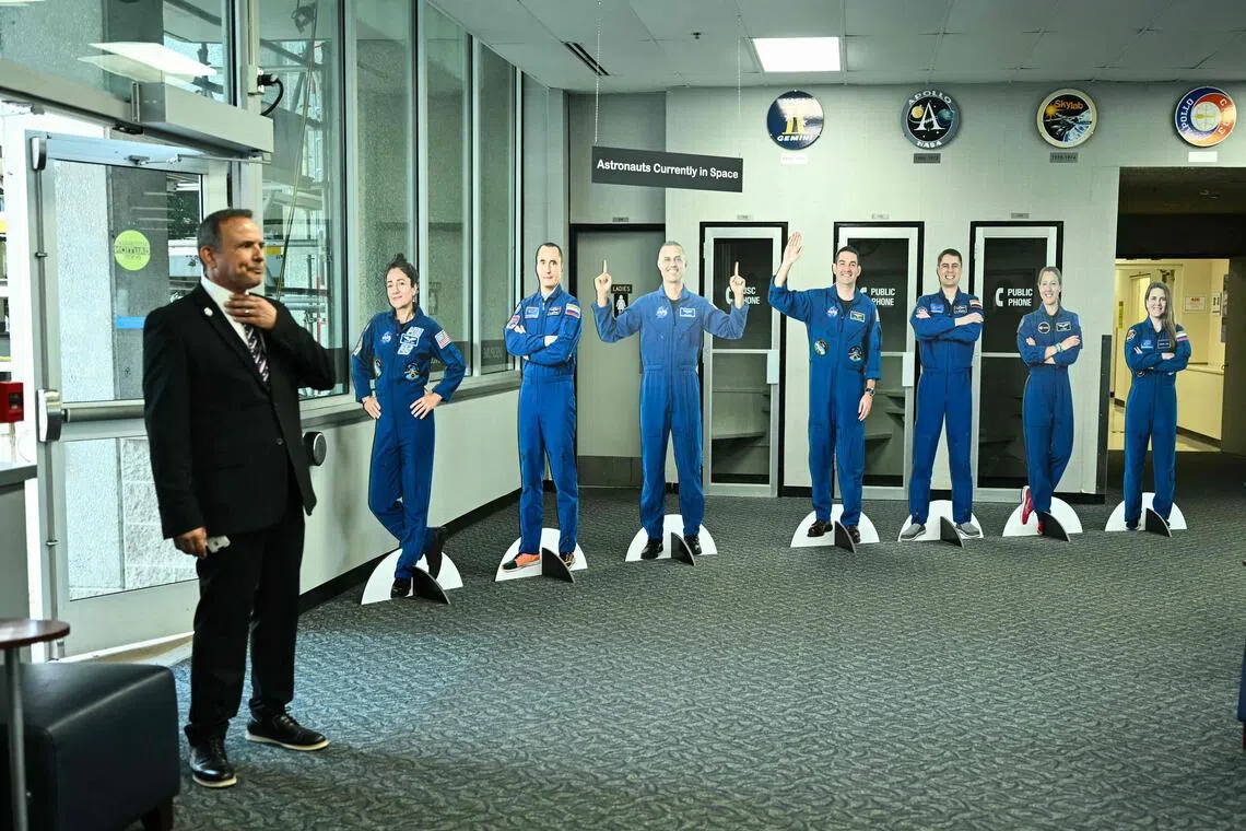 Cardboard cutouts of NASA astronauts are displayed as US President Donald Trump visits the NASA Lyndon B. Johnson Space Center in Houston, Texas, on Aug 28.