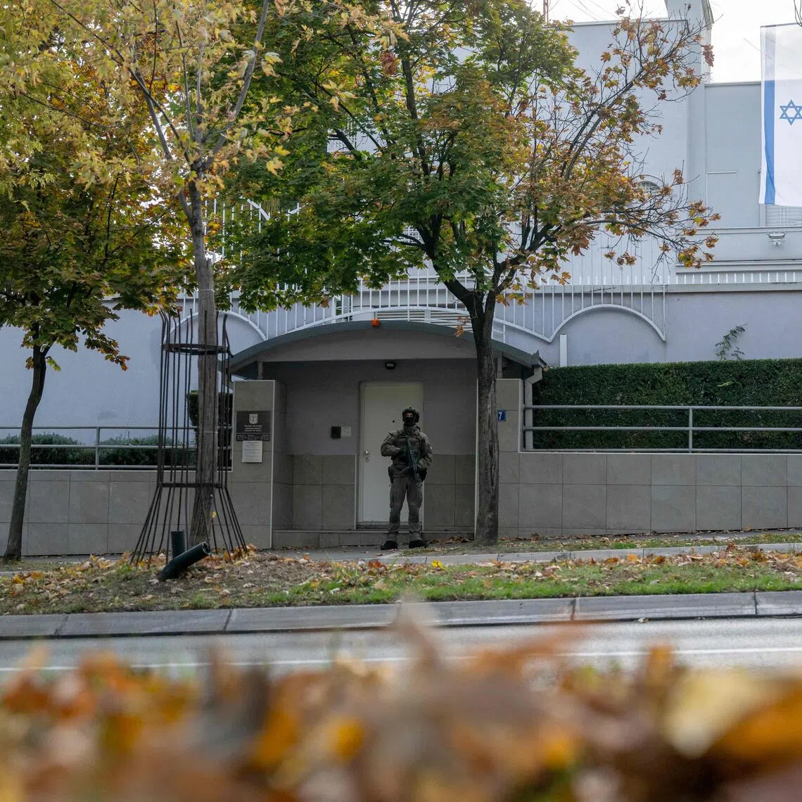 A member of Serbia’s Gendarmerie guarding the entrance to the Israeli embassy in Belgrade on Oct 28.