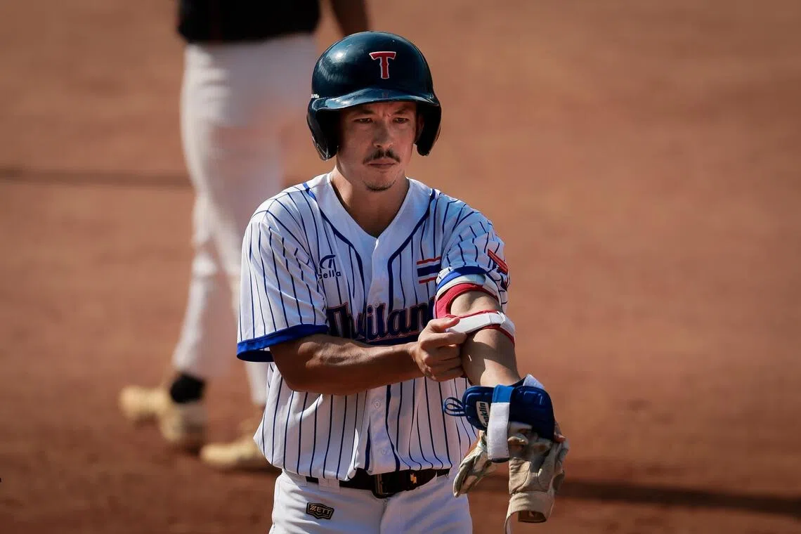 Thailand's Joe Daru in action during a 6-4 win over Singapore in a SEA Games match on Dec 9.