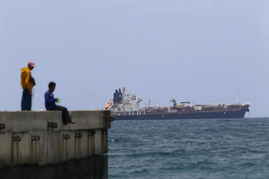 A Hong Kong-flagged vessel, carrying some 200,000 barrels of Russia-origin fuel, is anchored near the coast after arriving in Venezuelan waters, on March 28.