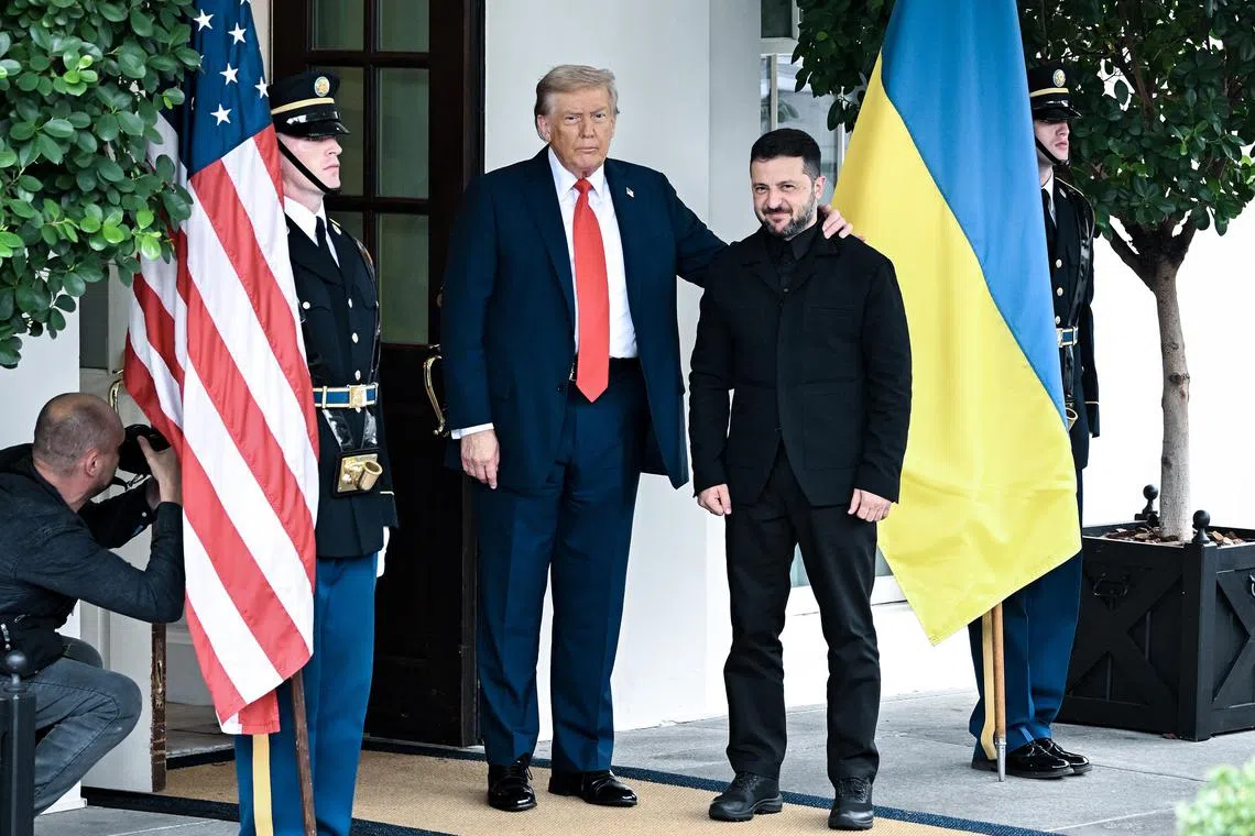 US President Donald Trump welcoming Ukrainian President Volodymyr Zelensky to the White House on Aug 18.