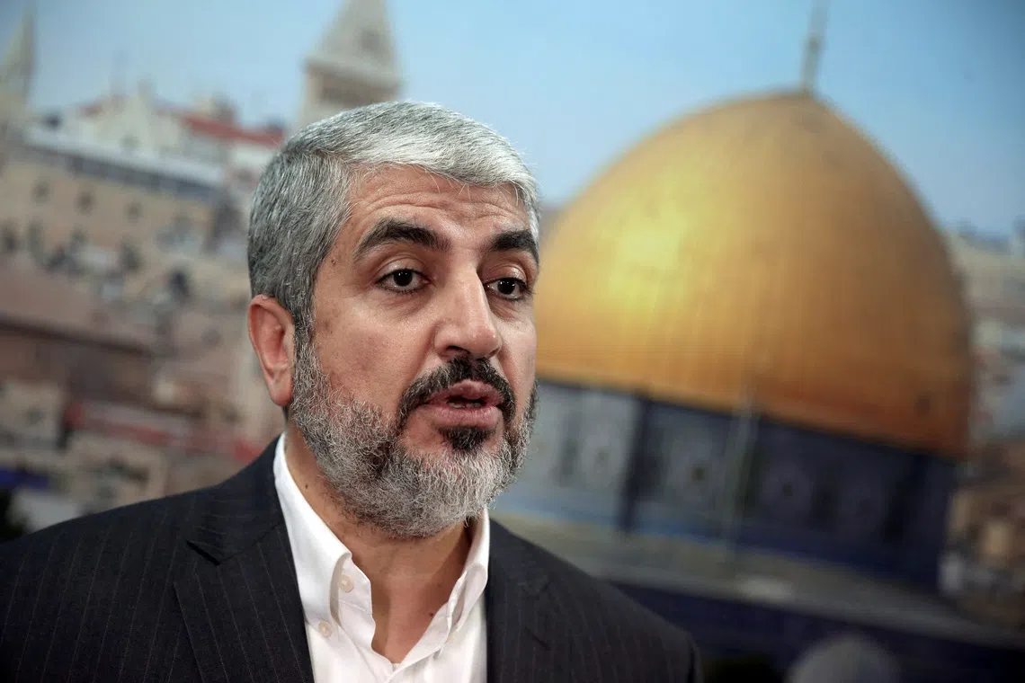 FILE PHOTO: Hamas leader Khaled Meshaal speaks during an interview with Reuters in Doha October 16, 2014.   REUTERS/Fadi Al-Assaad/File Photo