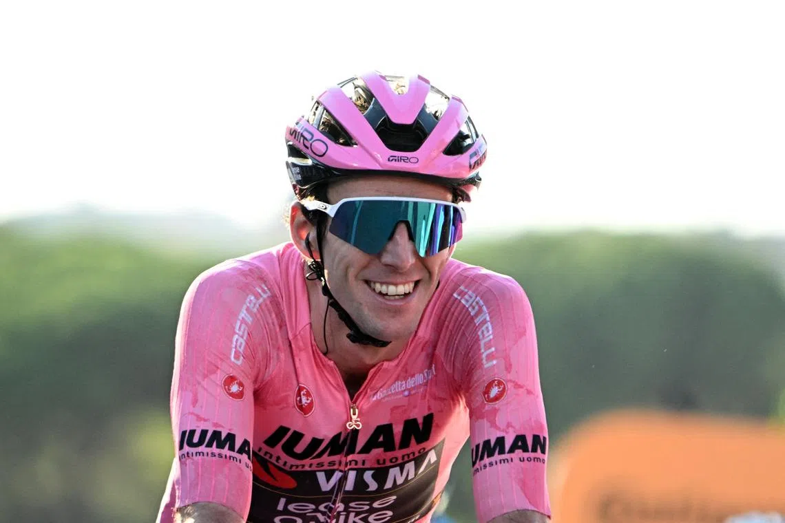 Cycling - Giro d'Italia - Stage 21 - Rome to Rome - Italy - June 1, 2025 Team Visma | Lease a Bike's Simon Yates celebrates after crossing the line to win the Giro d'Italia REUTERS/Jennifer Lorenzini