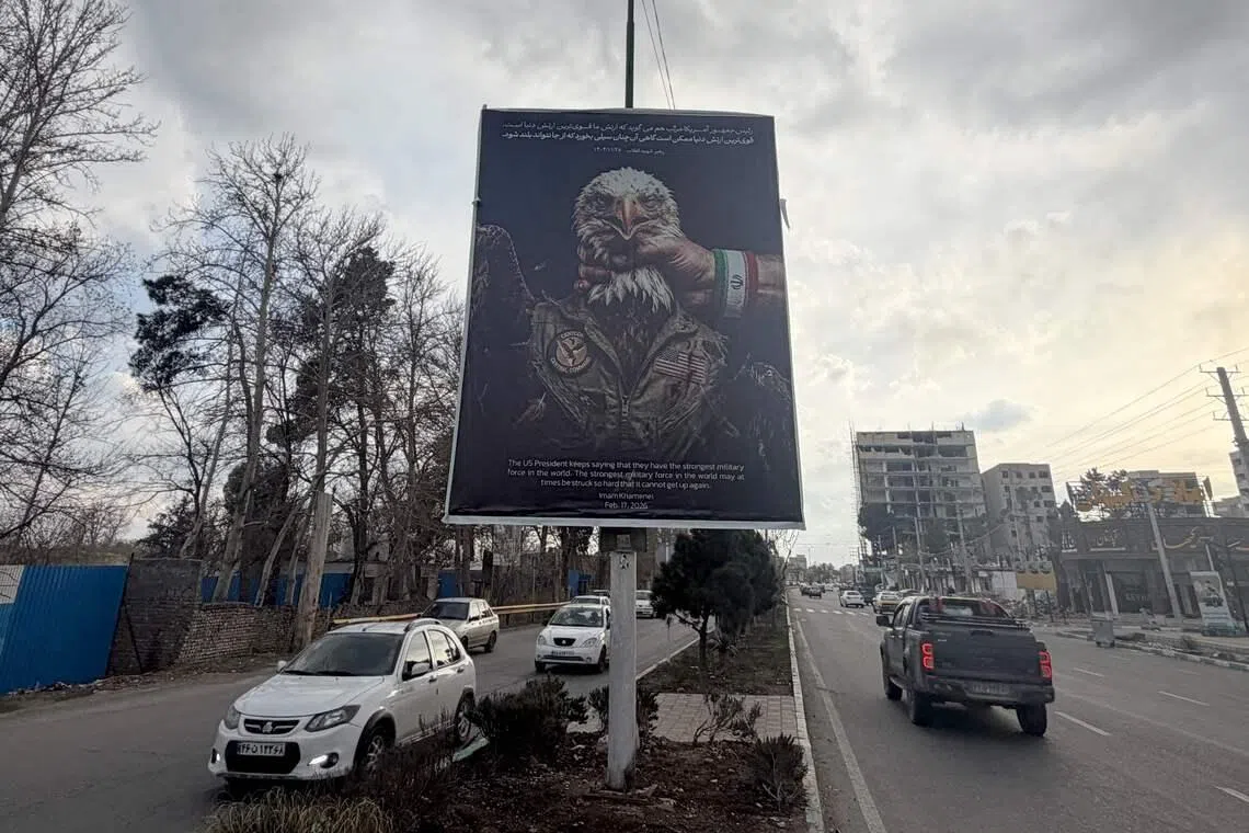 An anti-US banner on display in Tehran. The China guarantee is possibly the best exit opportunity for Mr Trump to extricate himself from the quagmire, says the writer.