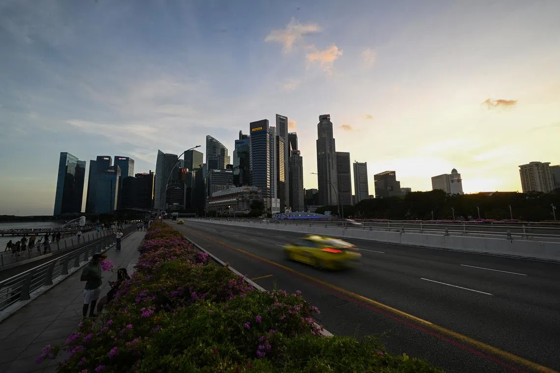 ST20240228_202478689815 pixgeneric Azmi Athni// Generic of Singapore's city skyline during sunset on Feb 28 Can be used for: Business; CBD; population; work; tourism; employment; traffic; GST; Singapore ST PHOTO: AZMI ATHNI