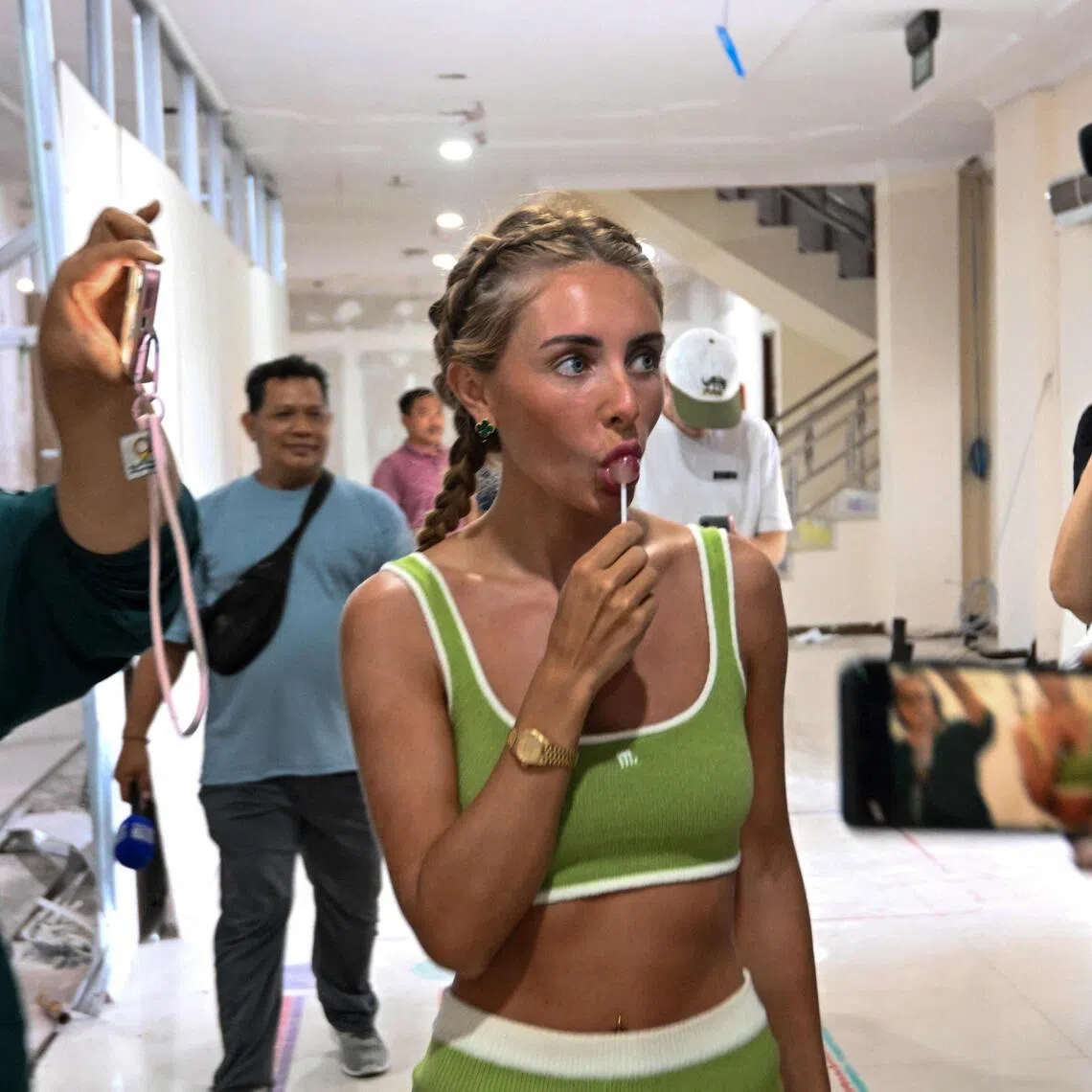 British adult content creator Tia Billinger, known as 'Bonnie Blue', arrives at Ngurah Rai Immigration Office in Bali on Dec 11.