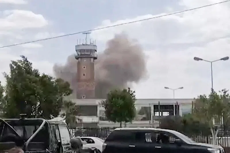 Smoke rising from the airport in Sanaa after it was purportedly struck by Yemen’s internationally-recognised government on July 13.