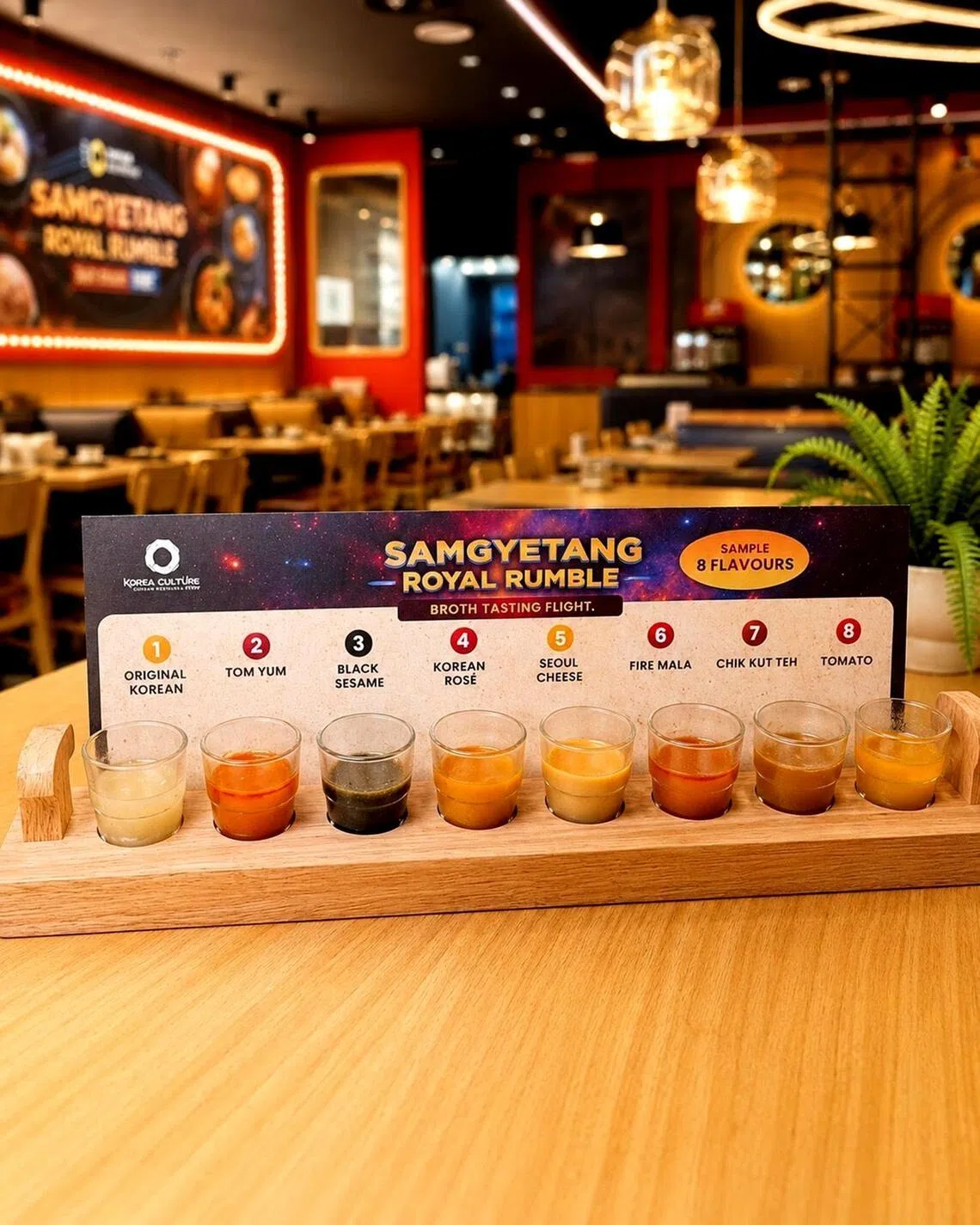 Diners who want to take part in Korea Culture’s Samgyetang Royal Rumble order a tasting flight of eight samgyetang broths and pick one to order.