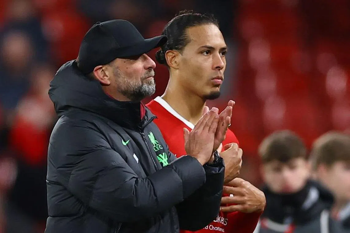 Soccer Football - Premier League - Liverpool v Manchester United - Anfield, Liverpool, Britain - December 17, 2023 Liverpool manager Juergen Klopp and Virgil van Dijk react after the match REUTERS/Molly Darlington/File Photo