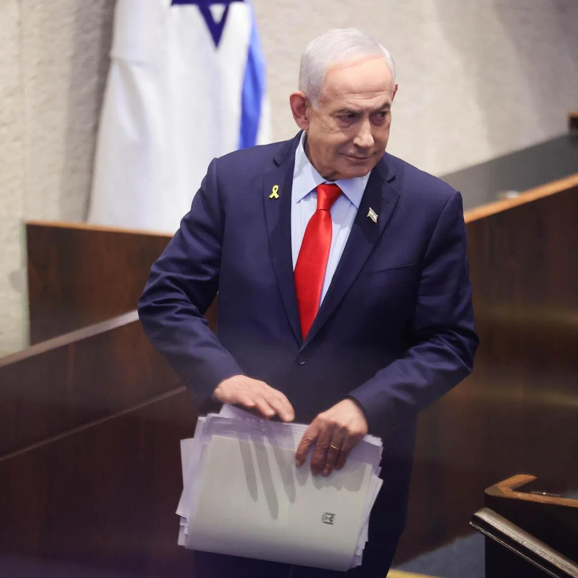 epa12629220 Israeli Prime Minister Benjamin Netanyahu attends a debate initiated by the opposition as part of a plenary session in the Knesset, the Israeli parliament, in Jerusalem, 05 January 2026. The title of the debate submitted by the opposition is 'An extremist government that acts contrary to the Zionist majority and harms national cohesion and the fundamental values of the State of Israel'.  EPA/ABIR SULTAN EPA